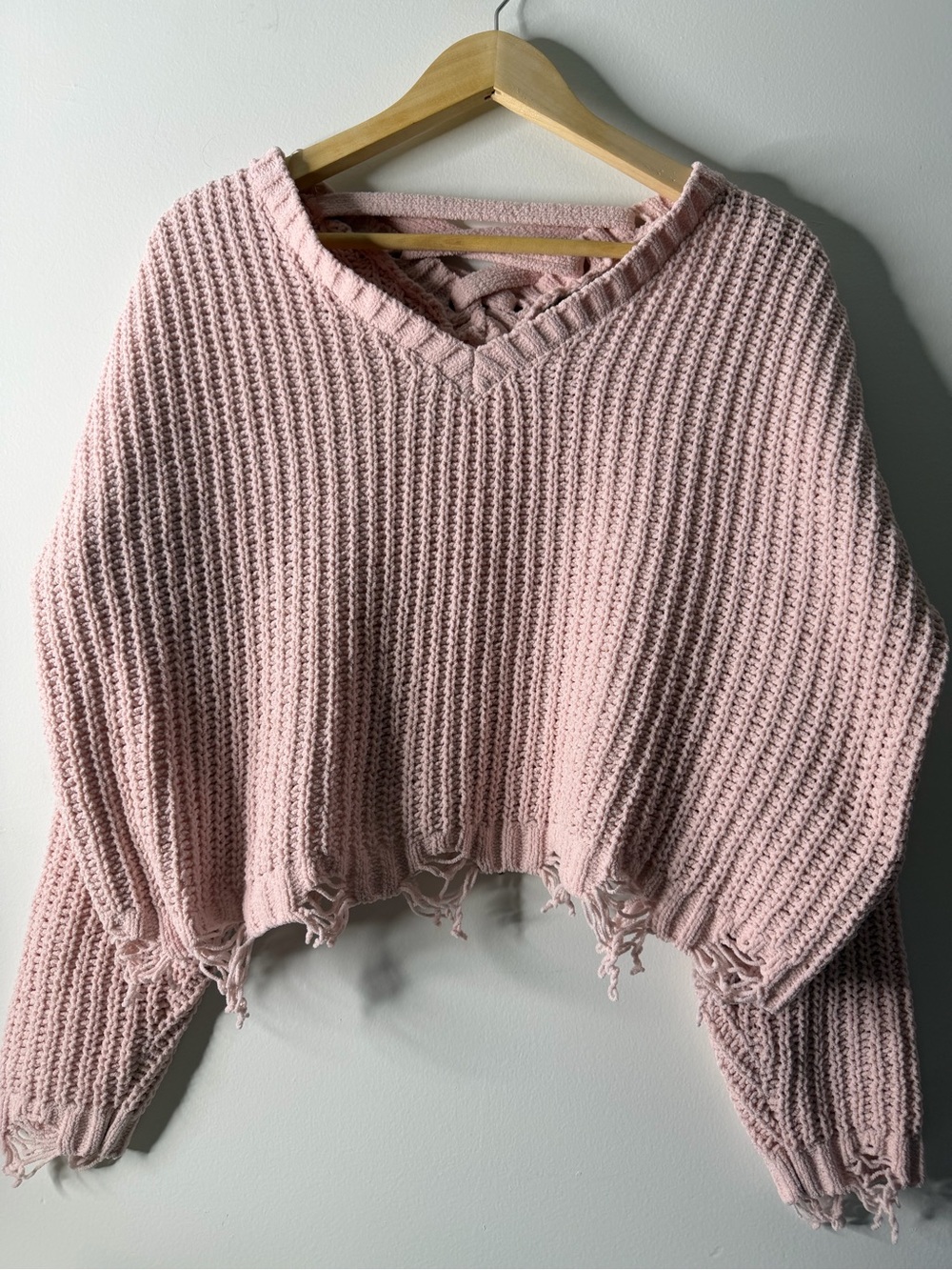 Derek Heart Cropped Distressed V-Neck Sweater in Light Pink